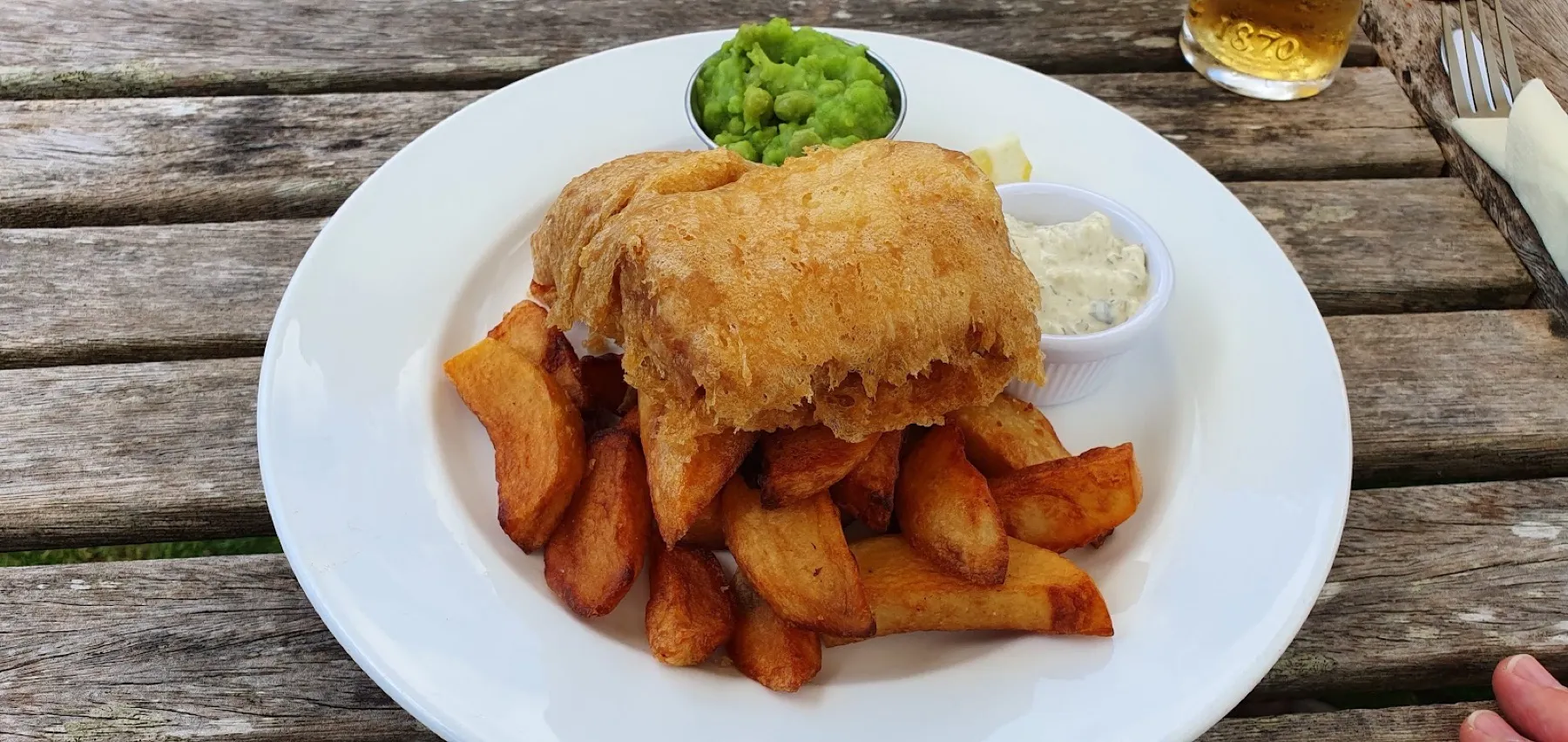 Fish and chips served outside in the garden